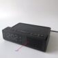 Spy camera wireless charger alarm clock radio front view